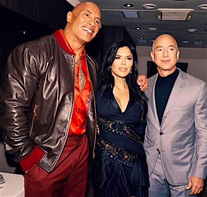 Jeff Bezos and Lauren Sánchez Share Toast With Dwayne Johnson in Backstage People's Choice Awards Snaps